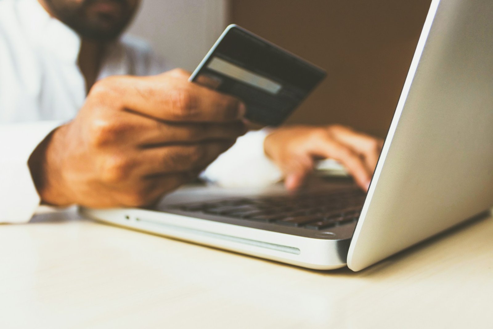Customer using a payment card while shopping online